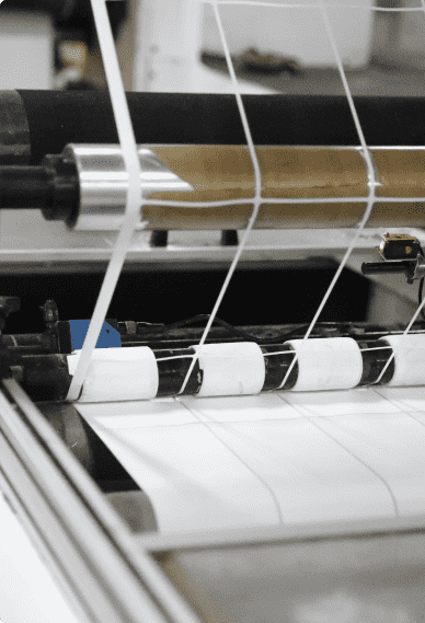 Labels in production running through a die cutter