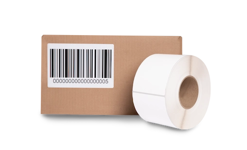 a labeled cardboard box and a roll of 4 x 6 labels
