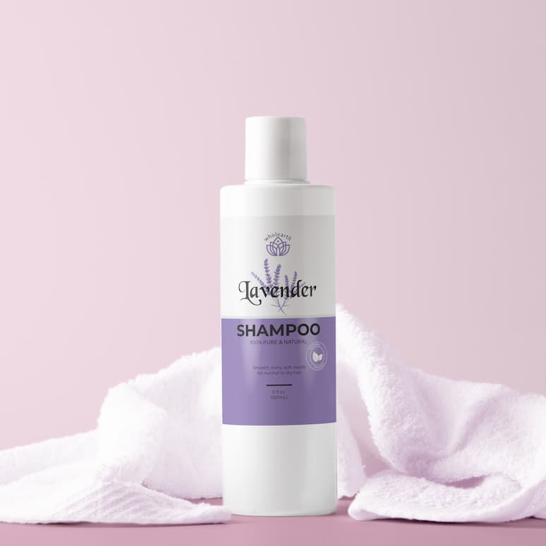a bottle of lavender shampoo with a towel behind