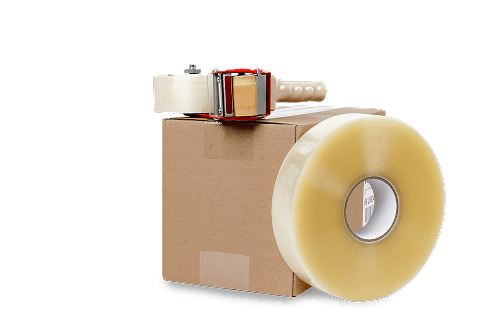 a cardboard box next to a roll of sealing tape, atop the box is a tape gun