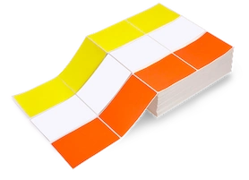 two stacks of fanfold labels