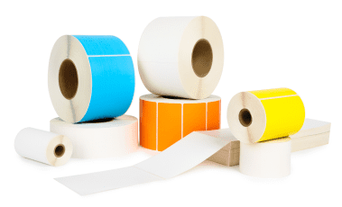 a pile of blank roll labels