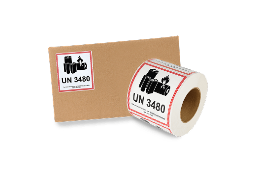 a labeled box next to a roll of battery labels