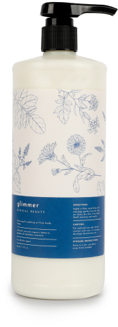 a bottle of body lotion called glimmer