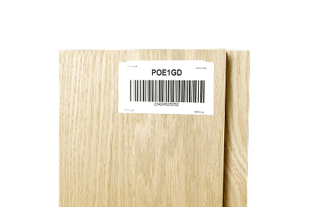 a small label on a piece of wood