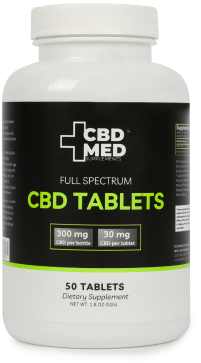 a bottle of CBD tablets