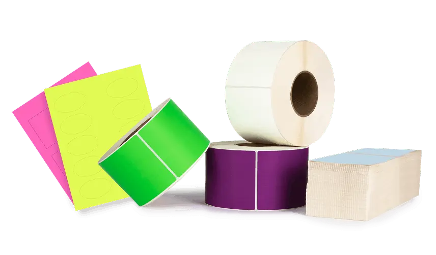 a pile of differently colored blank roll labels