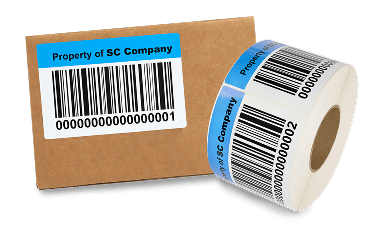 a labeled cardboard box next to a roll of labels