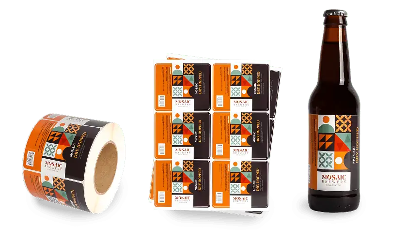 from left to right: a roll of custom labels, a sheet of custom labels, and a beer bottle with a custom label