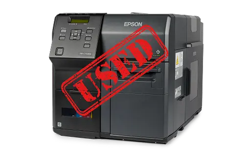 an epson printer with the word used stamped over it