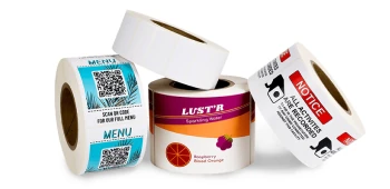 a pile of inkjet roll labels